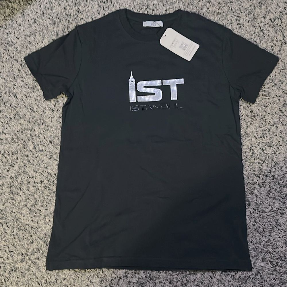 NWT. Woman’s RACA Istanbul Turkey, dark blue T-shirt. Size S.